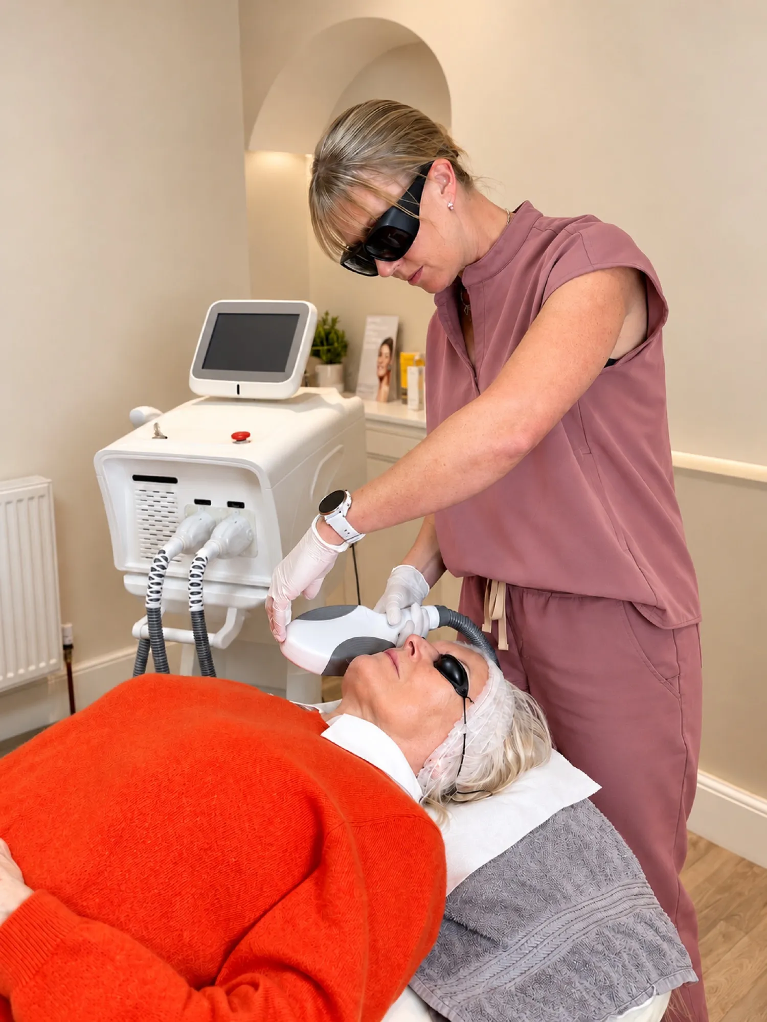 Karen carrying out a laser treatment